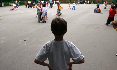A child alone in a school playground