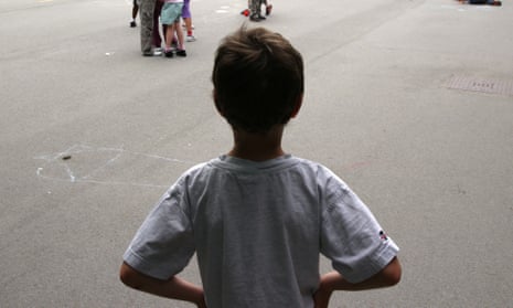 A child alone in a school playground
