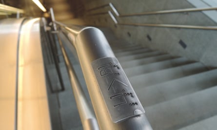 CapitaGreen Braille handrail. Accessible building for cities
