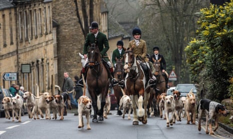 Riders and their hounds in Chipping Norton, Oxfordshire.