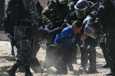 A man is arrested at a blockade zone in Cruce Ventilla in El Alto on Saturday