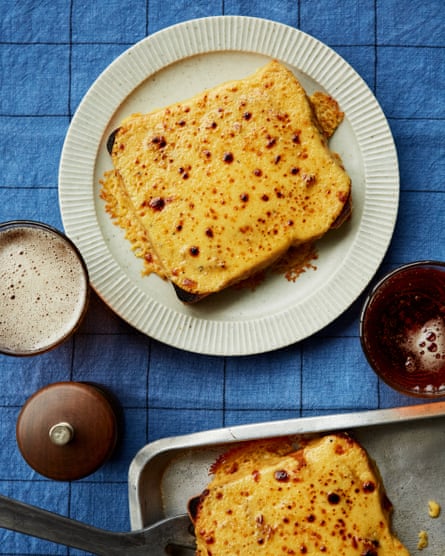 rarebit served with a glass of ale