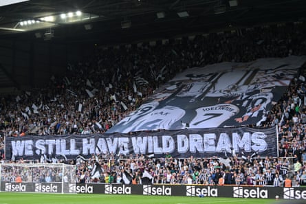 A banner that reads ‘We still have wild dreams’ on show at St James’ Park in August 2024.