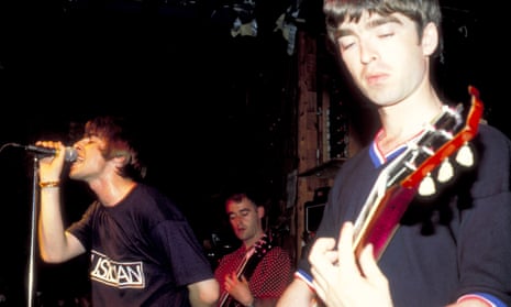 (L-R) Liam Gallagher, Bonehead and Noel Gallagher performing in New York in 1994.
