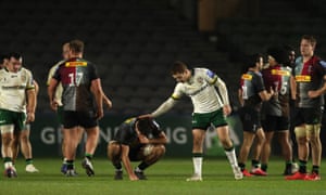 London Irish's Paddy Jackson (right) places his hand on Harlequins' Archie White's back to comfort him after the final whistle.