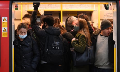 Passengers on a tube train in London, 29 November.
