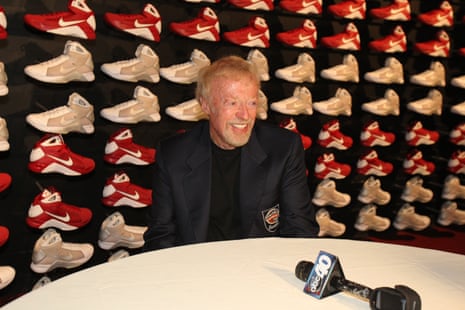 knight at table in front of wall full of nike shoes