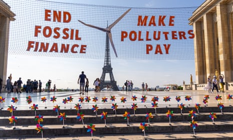 Climate activists transform the Eiffel Tower in Paris into wind turbine during a protest in June.