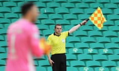 Douglas Ross in his role as an assistant referee during the Scottish Premiership game between Celtic and Hibernian on Sunday