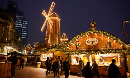 A windmill and a crepe stall at a Christmas market