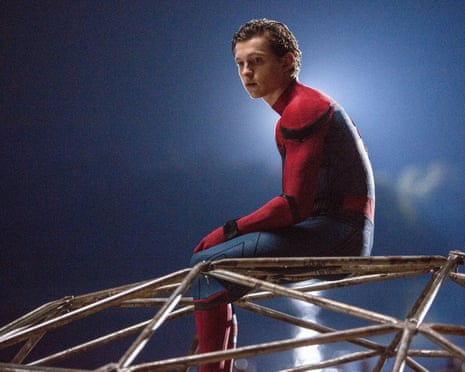 Tom Holland as Spider-Man perched on metal structure in 'Spider-Man: Homecoming'