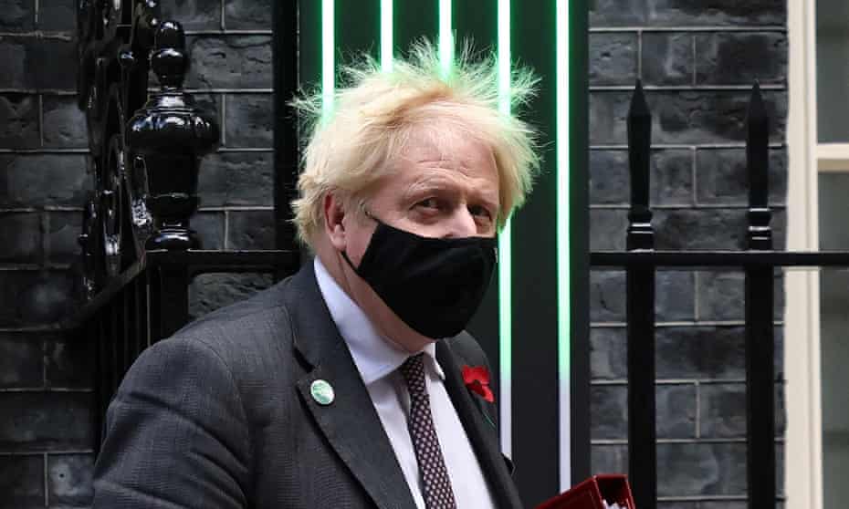 Boris Johnson leaves 10 Downing Street in London as more questions were asked about financial affairs.