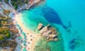 Spectacular aerial view of a beautiful beach bathed by a clear and turquoise sea in Greece. Whale shape in sea from rocks. Xigia Sulfur<br>2A24W40 Spectacular aerial view of a beautiful beach bathed by a clear and turquoise sea in Greece. Whale shape in sea from rocks. Xigia Sulfur