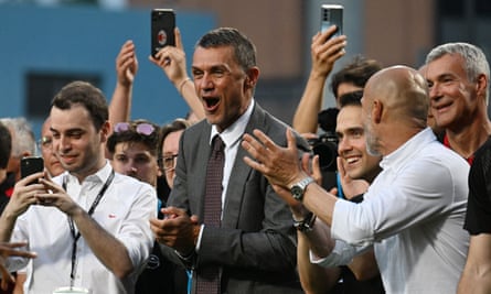 Milan’s technical director Paolo Maldini celebrates the title win.