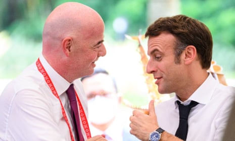 Gianni Infantino and Emmanuel Macron talk at the G20 Summit in Bali.