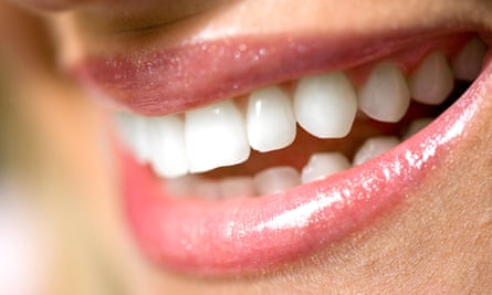 A woman’s smiling mouth