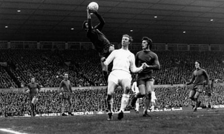 Peter Bonetti in goal for Chelsea leaps to grab the ball from Jack Charlton of Leeds United during the FA Cup final replay at Old Trafford, 1970. Chelsea won 2-1 after extra time.