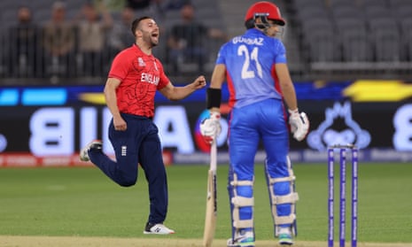 England bowler Mark Wood (left) reacts after dismissing Afghanistan batsman Rahmanullah Gurbaz.