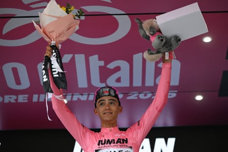 Isaac del Toro celebrates in the maglia rosa after the stage