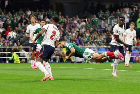 Raul Jimenez flings himself at the ball.
