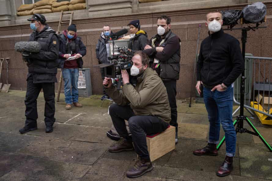 The A camera crew with cinematographer Frank Lamm seated.
