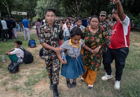 Soldier helping people to walk