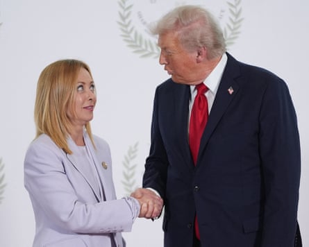 Trump and Meloni shaking hands during a Gaza summit in October.