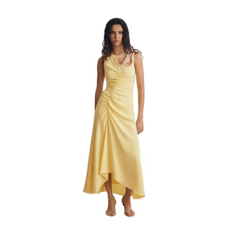 A model wears a Reiss Elizabeth Atelier Embellished-Shoulder maxidress in Yellow