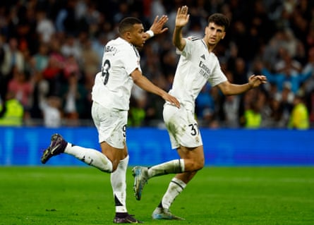 Kylian Mbappé celebrates his equaliser for Real Madrid by high-fiving Jacobo Ramón