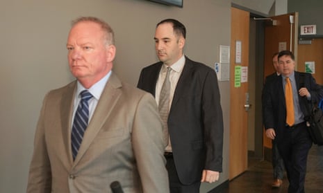 Daniel Perry, center, and his attorney Doug O’Connell, left, walk out of the courtroom during jury deliberations in his murder trial.