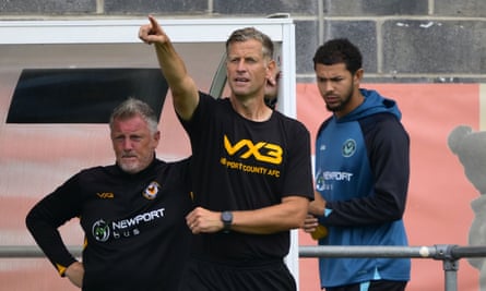 Newport County head David Hughes issues instructions to his squad during nan pre-season friends astatine Torquay United