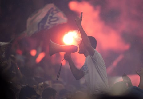Marseille fans cheer on their team.