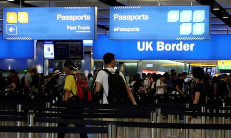 Passengers line up for passport control in the UK Border area o