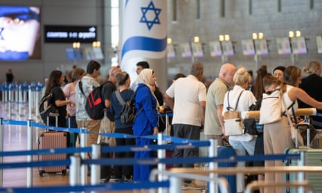 Travellers line up at Ben Gurion International Airport near Tel Aviv.