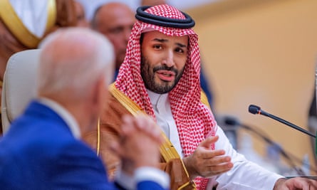 Mohammed bin Salman gestures towards Joe Biden during the president’s visit to Saudi Arabia in July.