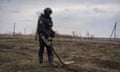 An emergency team carries out demining and destruction of explosives in Sulyhivka in Ukraine.