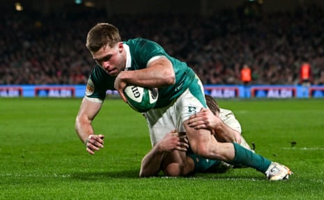 Jack Crowley goes over for the second Ireland try.