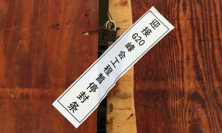 A seal on the entrance to a closed building site in Hangzhou reads: “Project suspended in order to welcome the G20 Summit”.