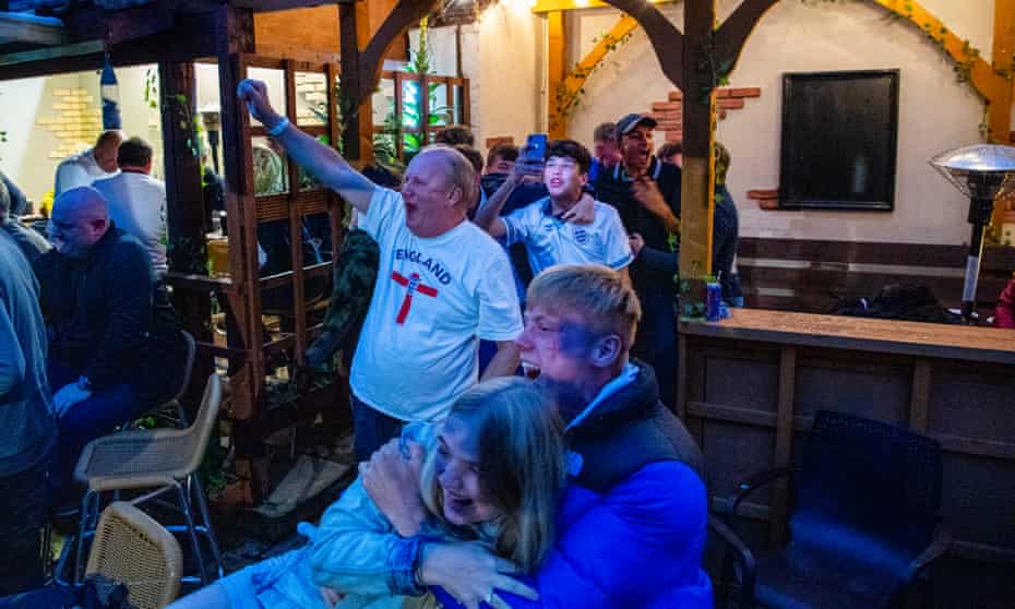 England supporters at the Spread Eagle pub in Stokesley, North Yorkshire, watch the team in the Euro 2020 semi-finals.