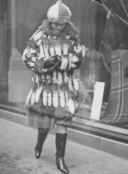 A shopper in Oxford Street wearing the new Russian boots, December 1925.
