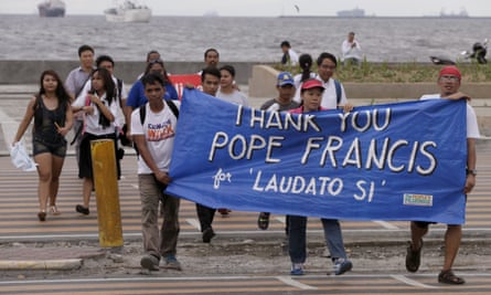 Filipino environmental activists on a Manila march thank Pope Francis for his encyclical, Laudato Si.