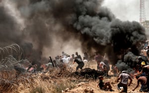 Palestinians cower under live fire as they clash with Israeli forces