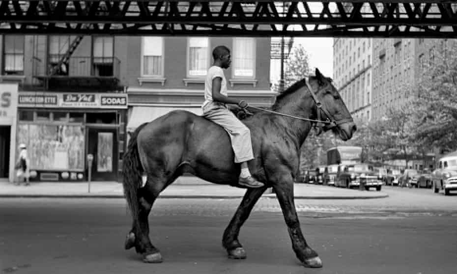 Vivian Maier’s 1953 portrait of a young man riding bareback under the elevated railway in New York.