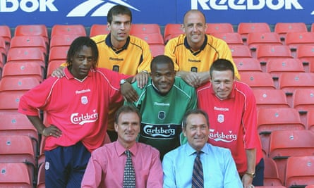 Gary McAllister poses with Liverpool’s other summer signings, as well as Phil Thompson, bottom left, and Gerard Houllier ahead of the 2000-01 season