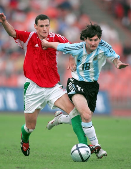 An 18 yr old Lionel Messi grapples with Hungary's Vilmos Vanczák and is sent off after 44 seconds on his Argentina debut.