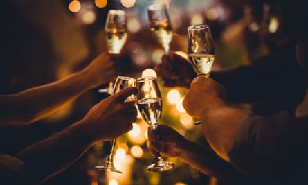 Numerous hands holding champagne flutes with champagne celebratory toast silhouettes