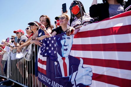 Supporters of Donald Trump listen to him speak during his arrival at Burke Lakefront airport in Cleveland, Ohio, on 6 August.