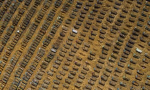 BRAZIL-HEALTH-VIRUS-CEMETERYAerial view showing graves in the Nossa Senhora Aparecida cemetery in Manaus, Brazil, on Monday. Brazil’s death toll has passed 80,000.