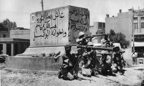 Revolutionary soldiers in a street of Baghdad, Iraq, July 14, 1958.