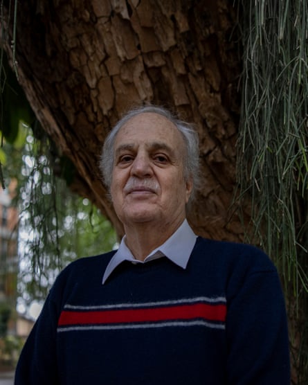 Carlos Nobre stood under a tree while looking at the camera